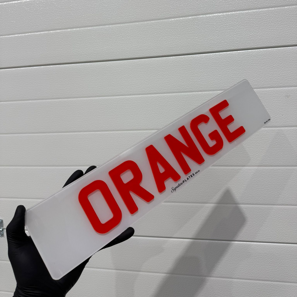 Signature Plates Orange Backed License Plate